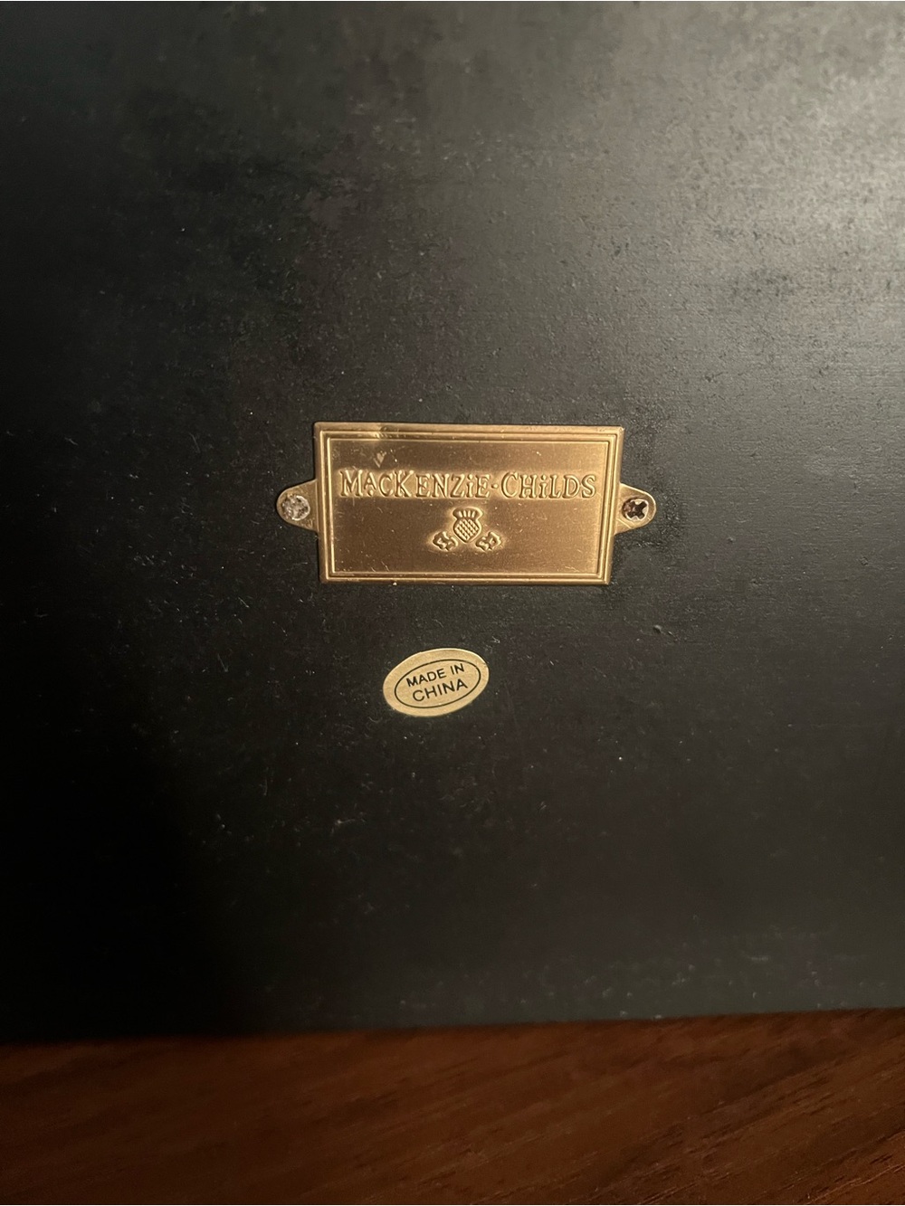 MacKenzie-Childs Gold Label Plaque on Black Surface - Picture 5 of 6